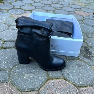 Black Steve Madden boots leather upper.